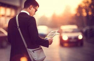 Businessman reading newspaper