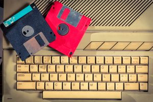 Vintage floppy disks and keyboard